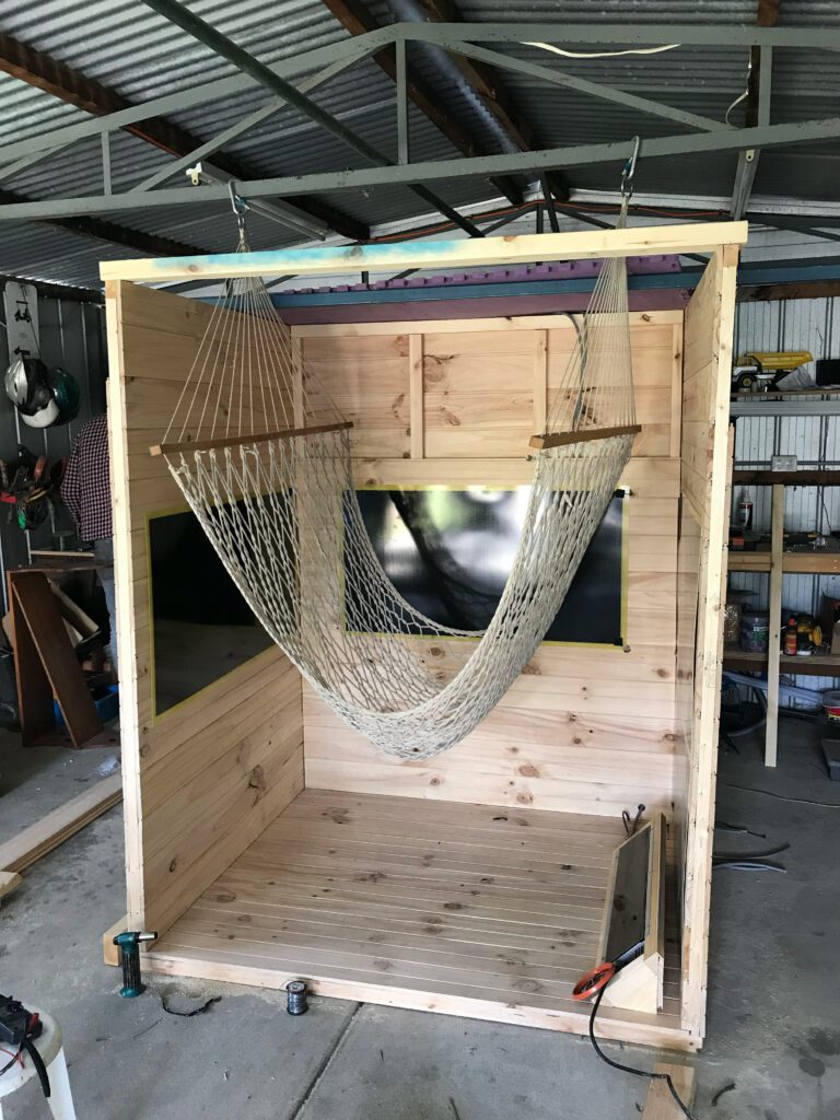 Creative infrared sauna installation with hammock