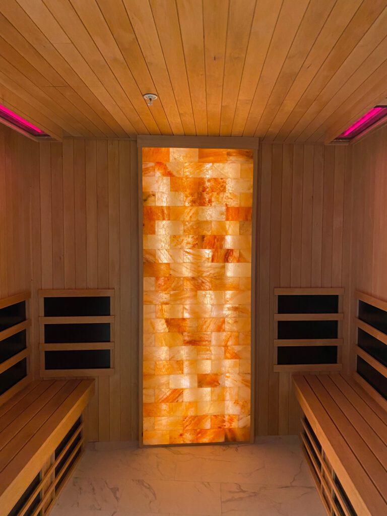 Custom infrared sauna with Himalayan salt wall feature